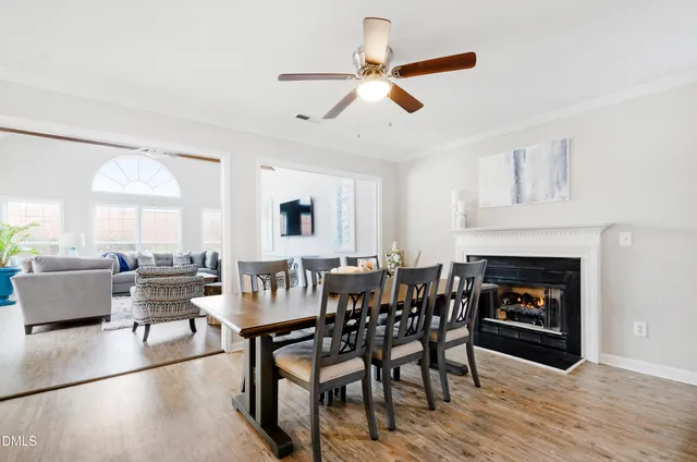 a view of a livingroom with furniture and a fireplace