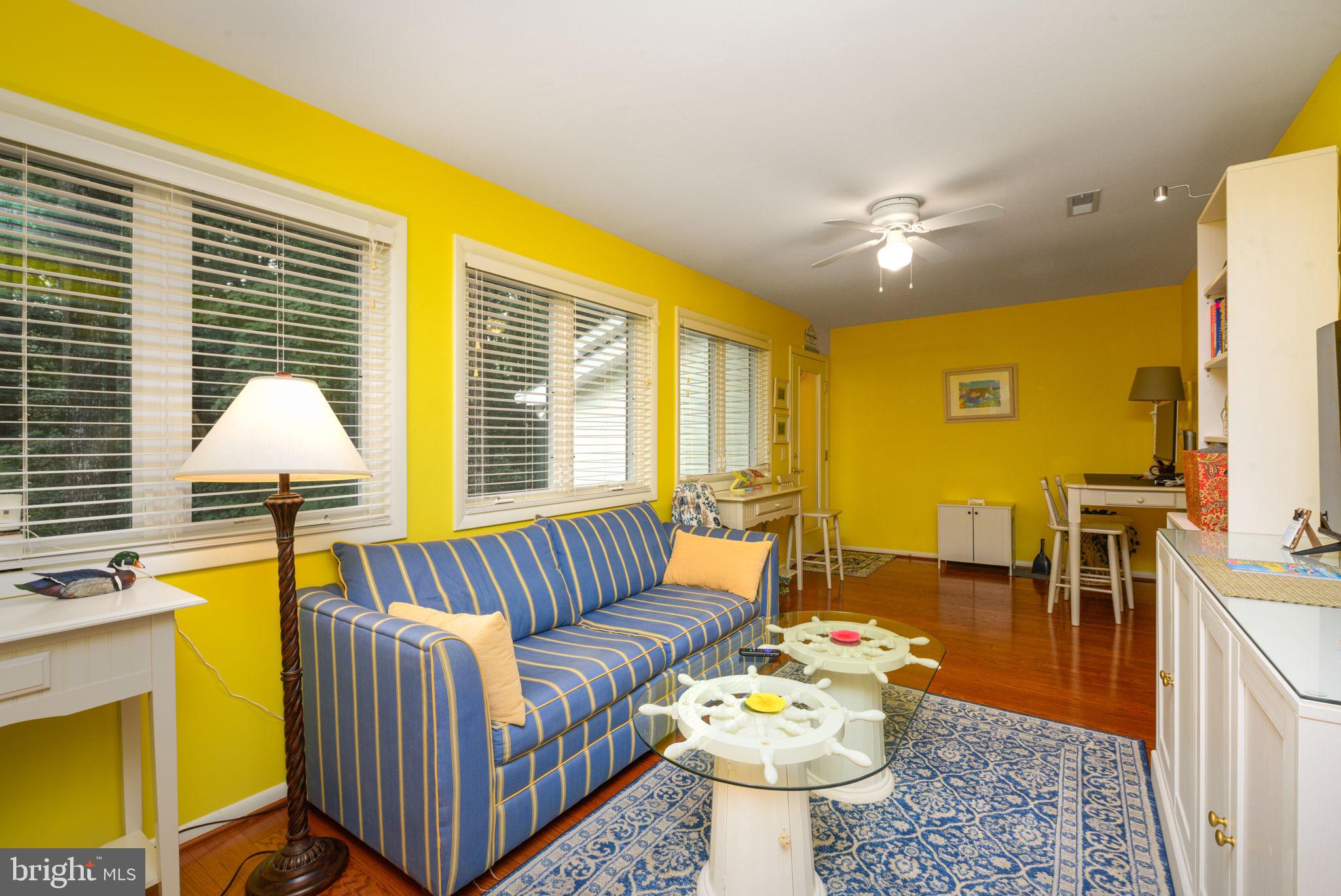 10 Gloucester Road Ocean Pines, MD 21811 - Photo 18 of 37 a living room with furniture and a table
