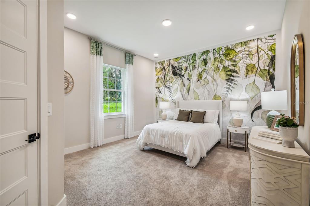 6406 Summit View Drive Brooksville, FL 34601 - Photo 47 of 59 a spacious bedroom with a bed and a window