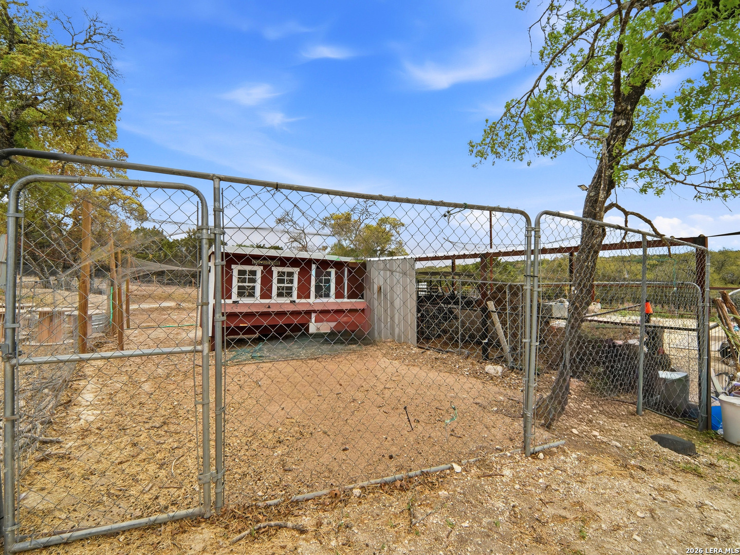 132 Fm 474 Boerne, TX 78006 - Photo 15 of 49 a view of a house with a wooden fence