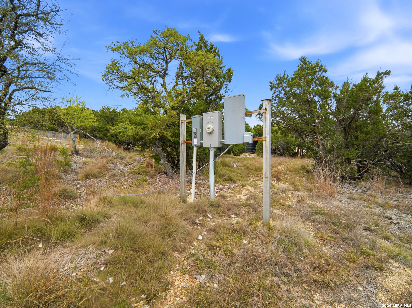 132 Fm 474 Boerne, TX 78006 - Photo 24 of 49 a backyard of a house with table and chairs
