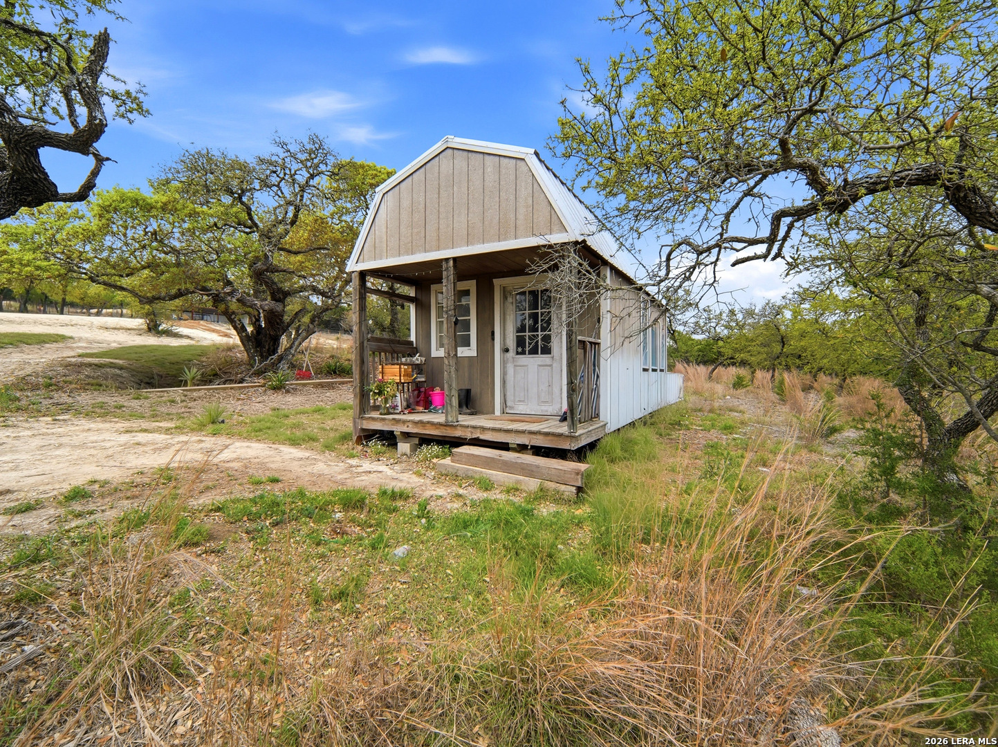 132 Fm 474 Boerne, TX 78006 - Photo 7 of 49 a view of backyard with small garden and entertaining space