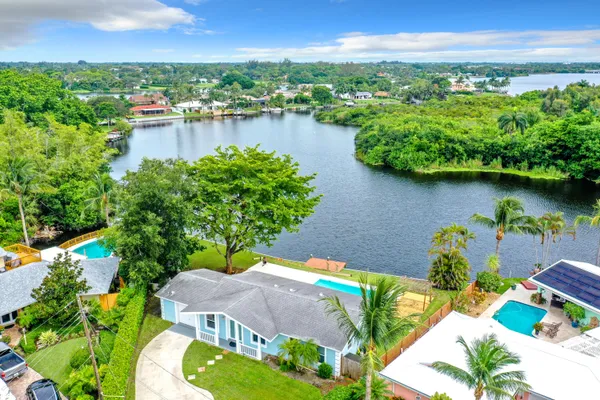 a view of a lake with a yard and outdoor space