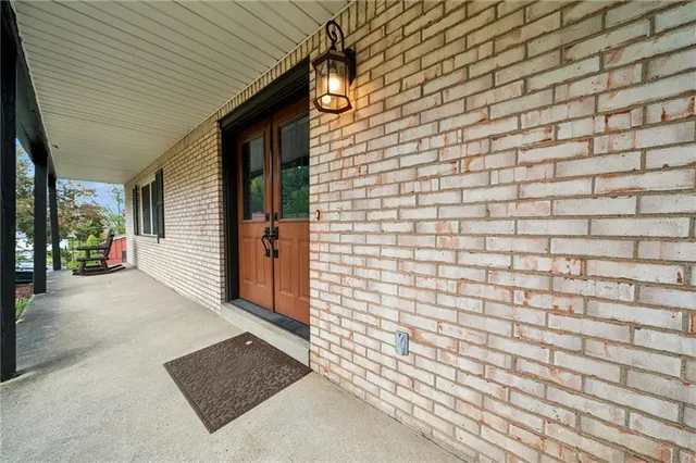 a view of a brick house with a door