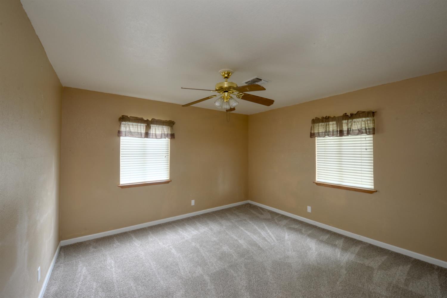 2931 East Marshall Road Patterson, CA 95363 - Photo 17 of 54 1st Bedroom with ceiling fan