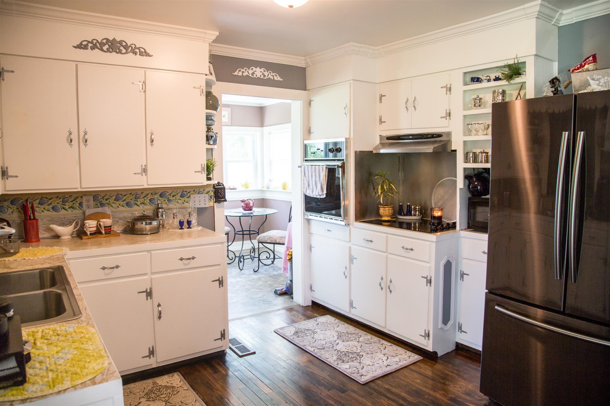 699 Mcelhiney Road Dickson, TN 37055 - Photo 12 of 25 a kitchen with stainless steel appliances a refrigerator sink and cabinets