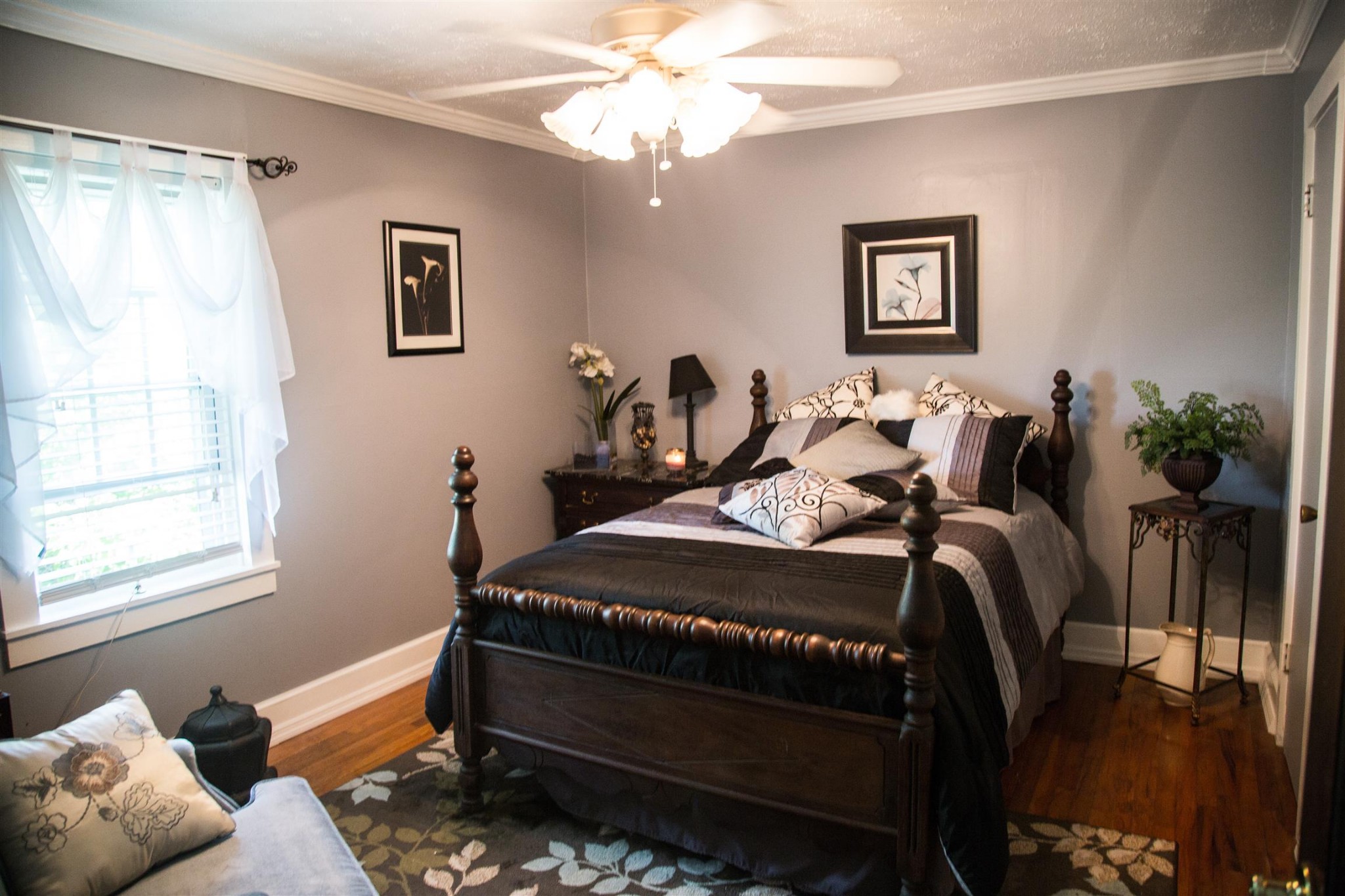 699 Mcelhiney Road Dickson, TN 37055 - Photo 7 of 25 a bed room with a bed and a chandelier