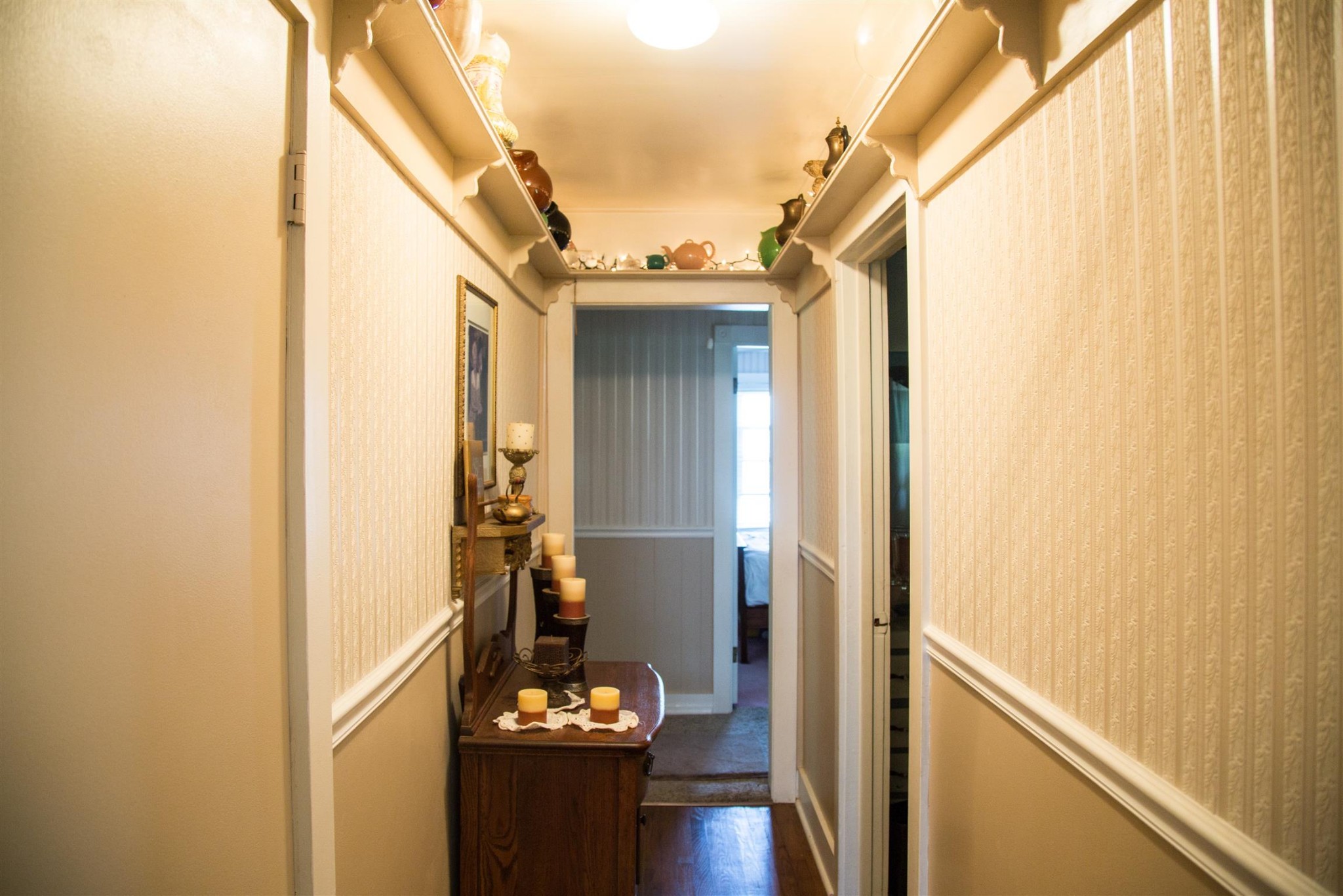 699 Mcelhiney Road Dickson, TN 37055 - Photo 9 of 25 a view of a hallway with wooden floor and furniture