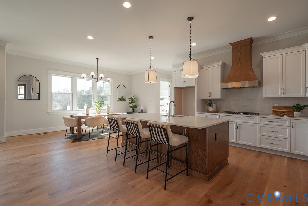 2110 Manakin Road Manakin-Sabot, VA 23103 - Photo 18 of 50 Kitchen featuring ornamental molding, white cabine