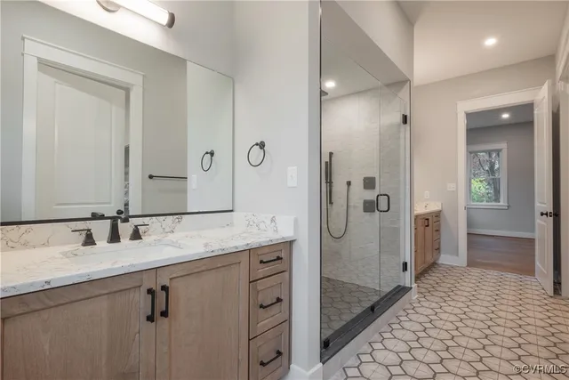 an aerial view of a golf course with a lake view