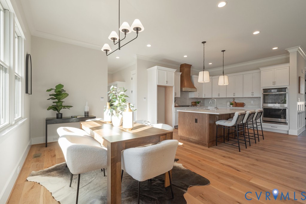 2110 Manakin Road Manakin-Sabot, VA 23103 - Photo 27 of 50 Large dining space with crown molding, light wood