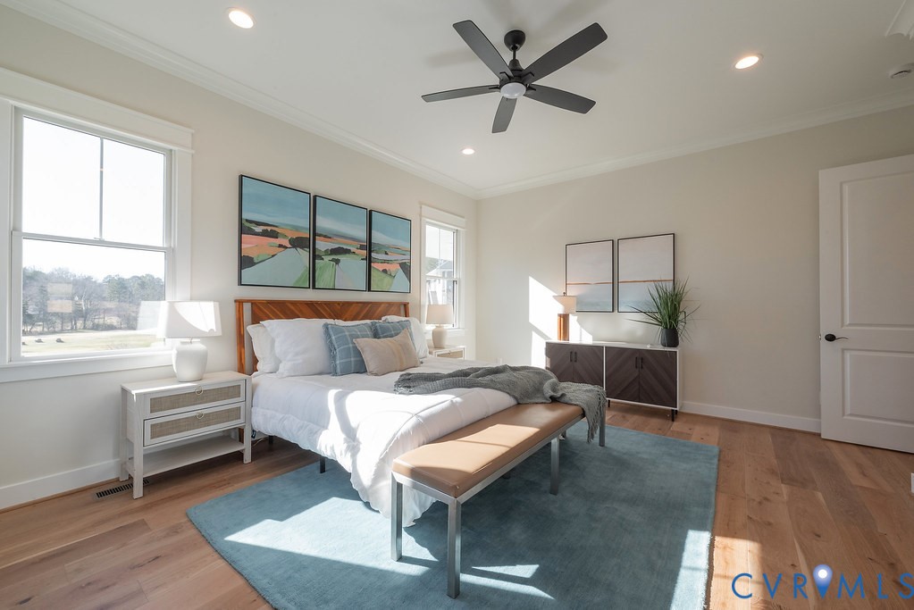 2110 Manakin Road Manakin-Sabot, VA 23103 - Photo 31 of 50 First floor primary bedroom suite with light wood