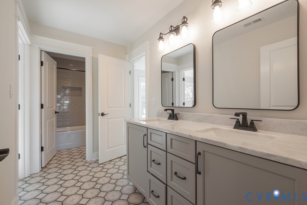 2110 Manakin Road Manakin-Sabot, VA 23103 - Photo 40 of 50 Bathroom featuring double vanity, shower / washtub
