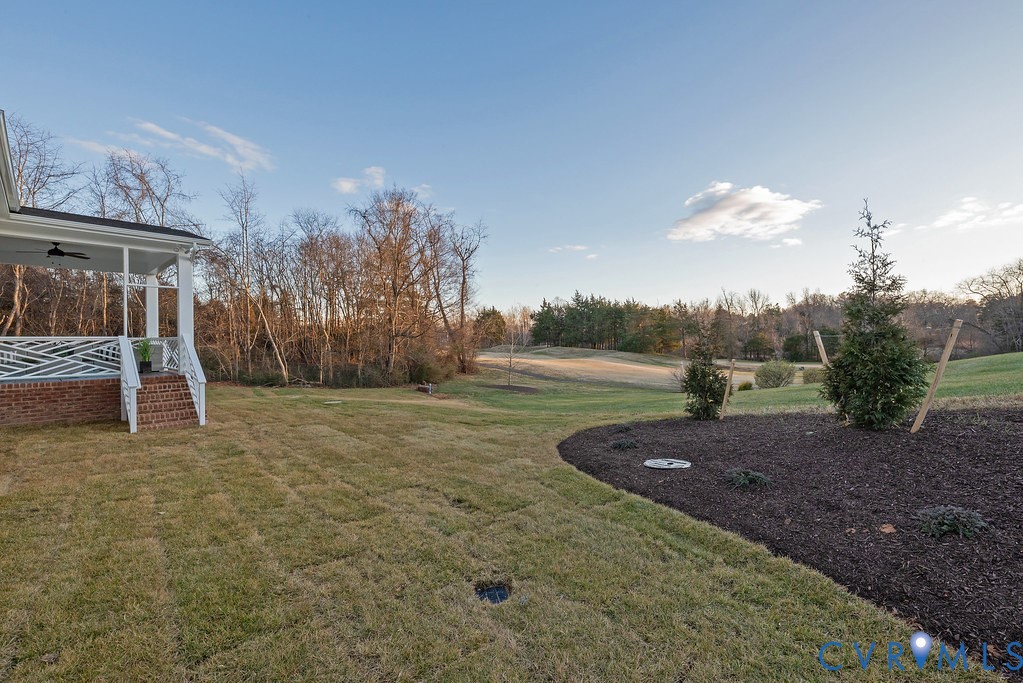 2110 Manakin Road Manakin-Sabot, VA 23103 - Photo 46 of 50 View of grassy yard featuring view of wooded area