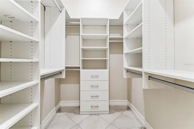 a view of an empty walk in closet