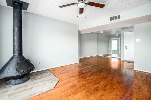 a view of livingroom and hardwood floor