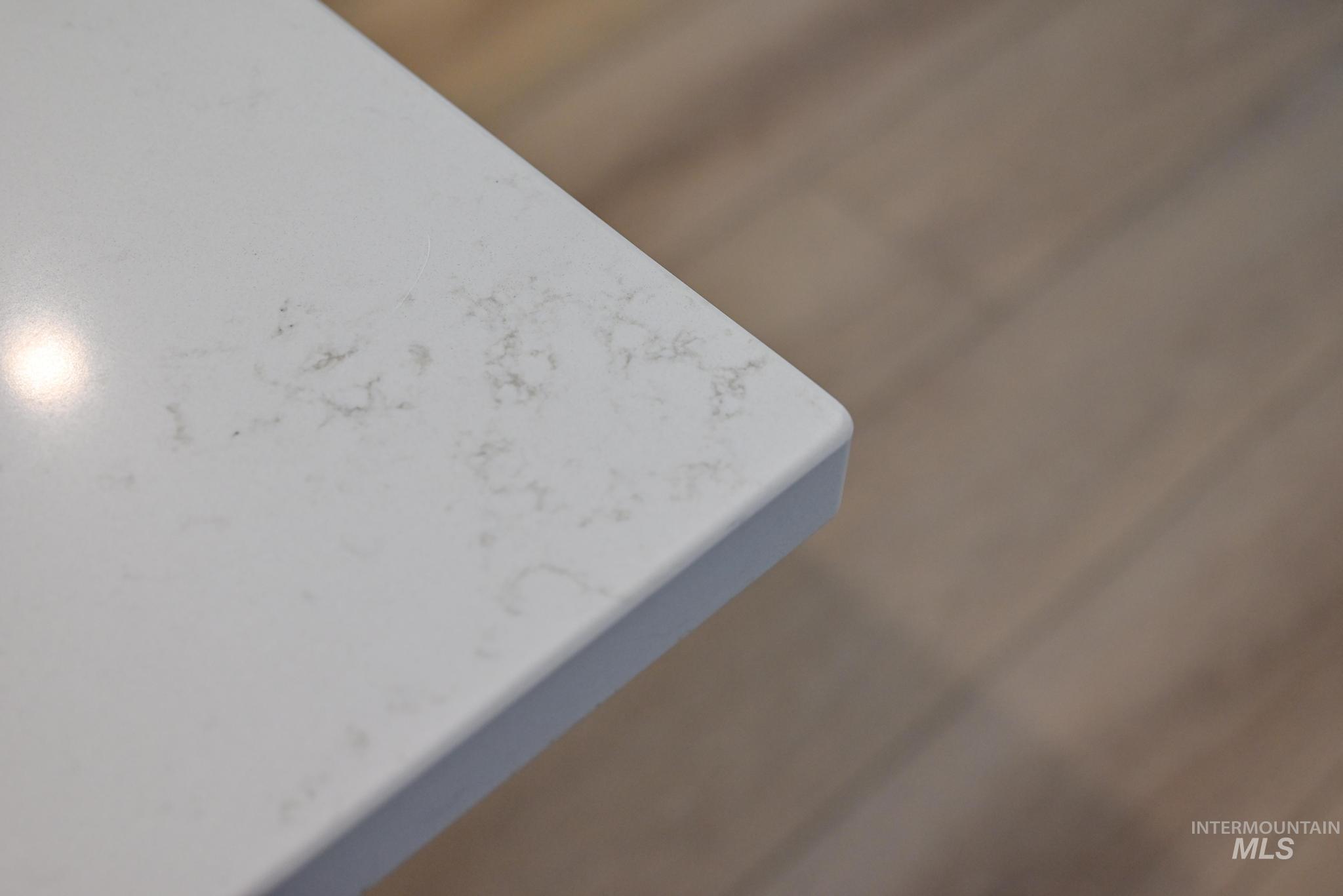 9074 West Moonglade Street Star, ID 83669 - Photo 17 of 40 White countertop featuring subtle grey veining and a rounded edge profile