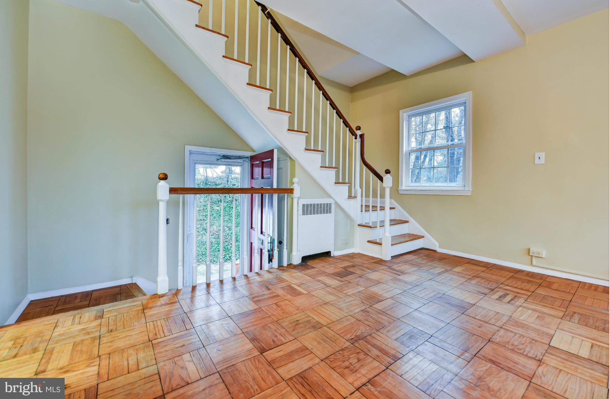 3538 Gunston Road Alexandria, VA 22302 - Photo 2 of 30 a view of entryway and hall with wooden floor