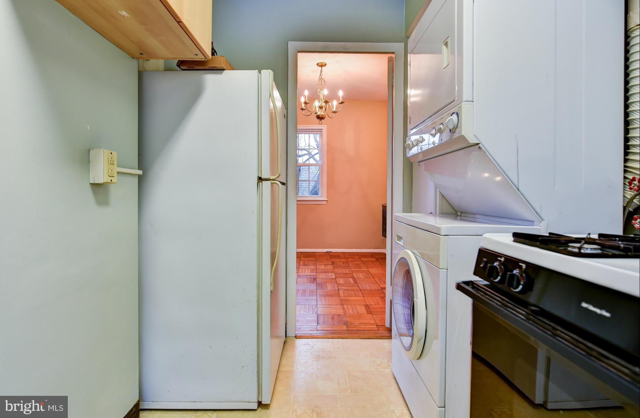 3538 Gunston Road Alexandria, VA 22302 - Photo 11 of 30 a kitchen with a stove and a refrigerator