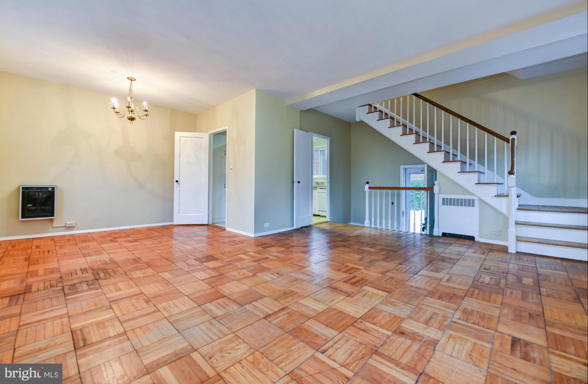 3538 Gunston Road Alexandria, VA 22302 - Photo 6 of 30 a view of an empty room with stairs and a view of bedroom