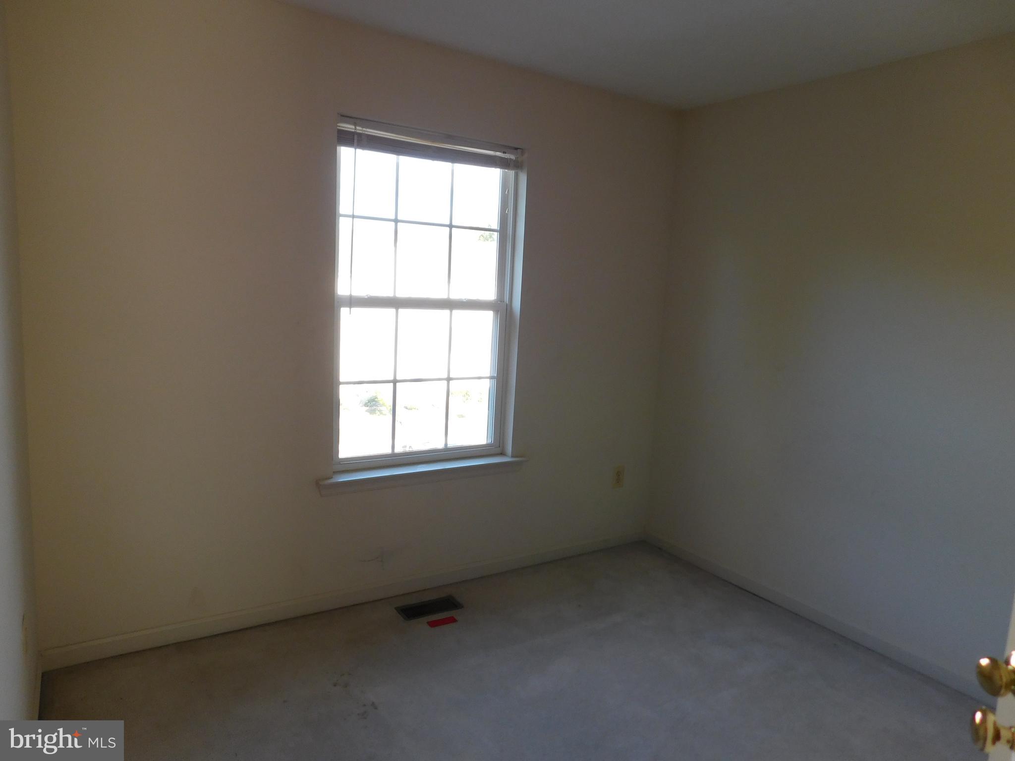 2452 Beaver Crossing Road Edgewood, MD 21040 - Photo 14 of 18 an empty room with a window