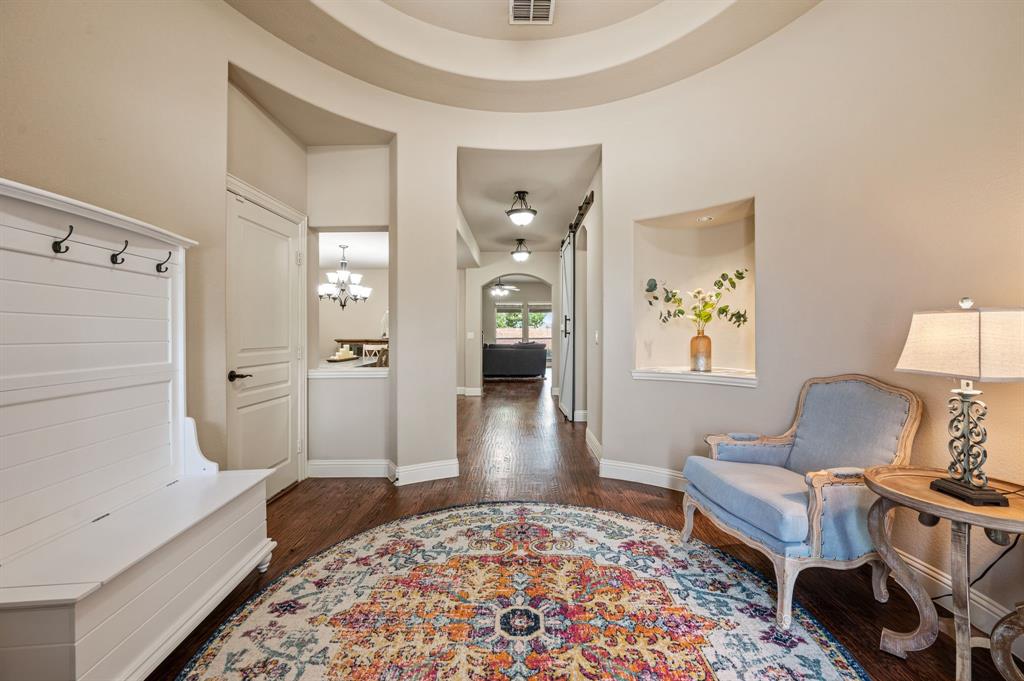 5209 Edgebrook Way Fort Worth, TX 76244 - Photo 7 of 33 a living room with furniture and a rug