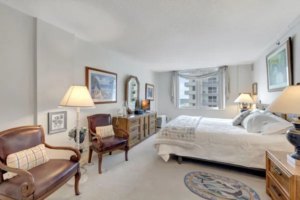 a view of a balcony with a painting on the wall