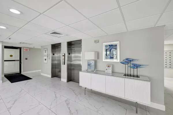 a kitchen with a cabinets and refrigerator