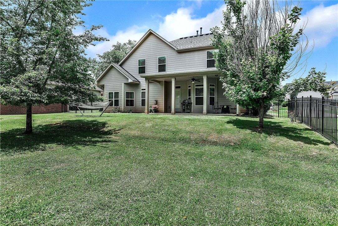144 Buckland Drive Anderson, SC 29621 - Photo 27 of 48 A spacious grassy yard with a covered patio provides ample outdoor living space.