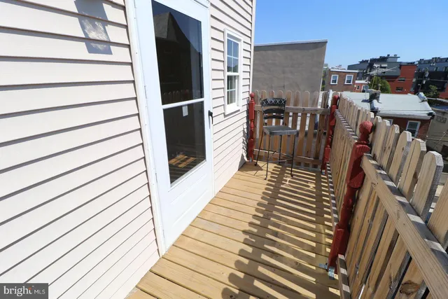 a balcony with an outdoor space