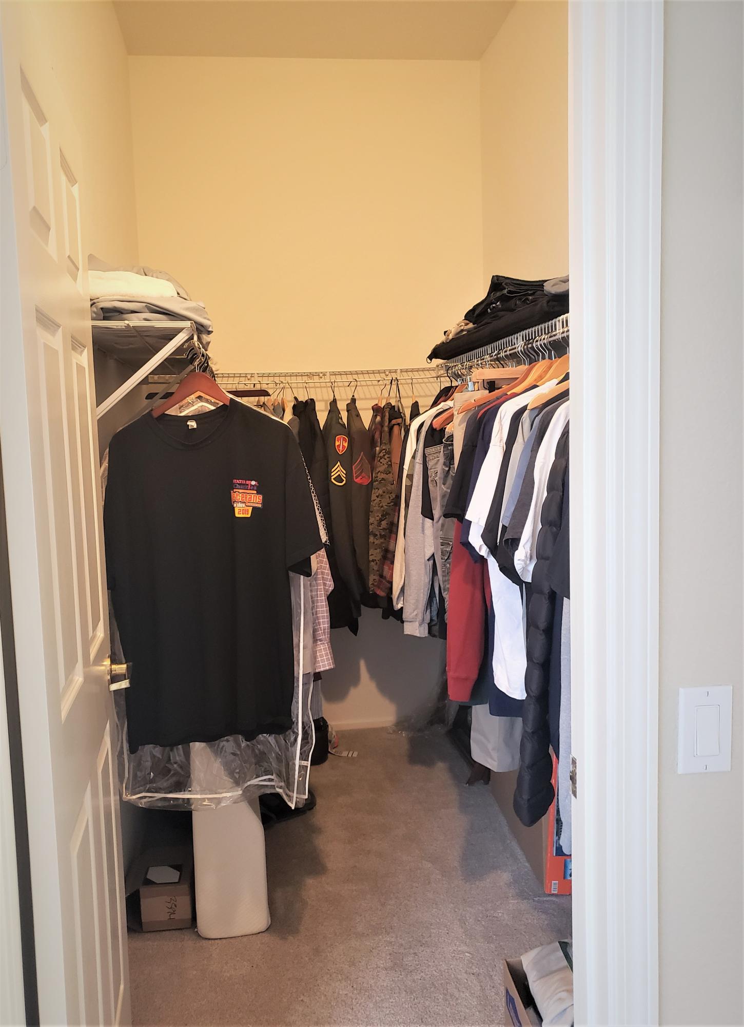 44017 Royal Troon Drive Indio, CA 92201 - Photo 19 of 33 a view of walk in closet with clothes and shoes