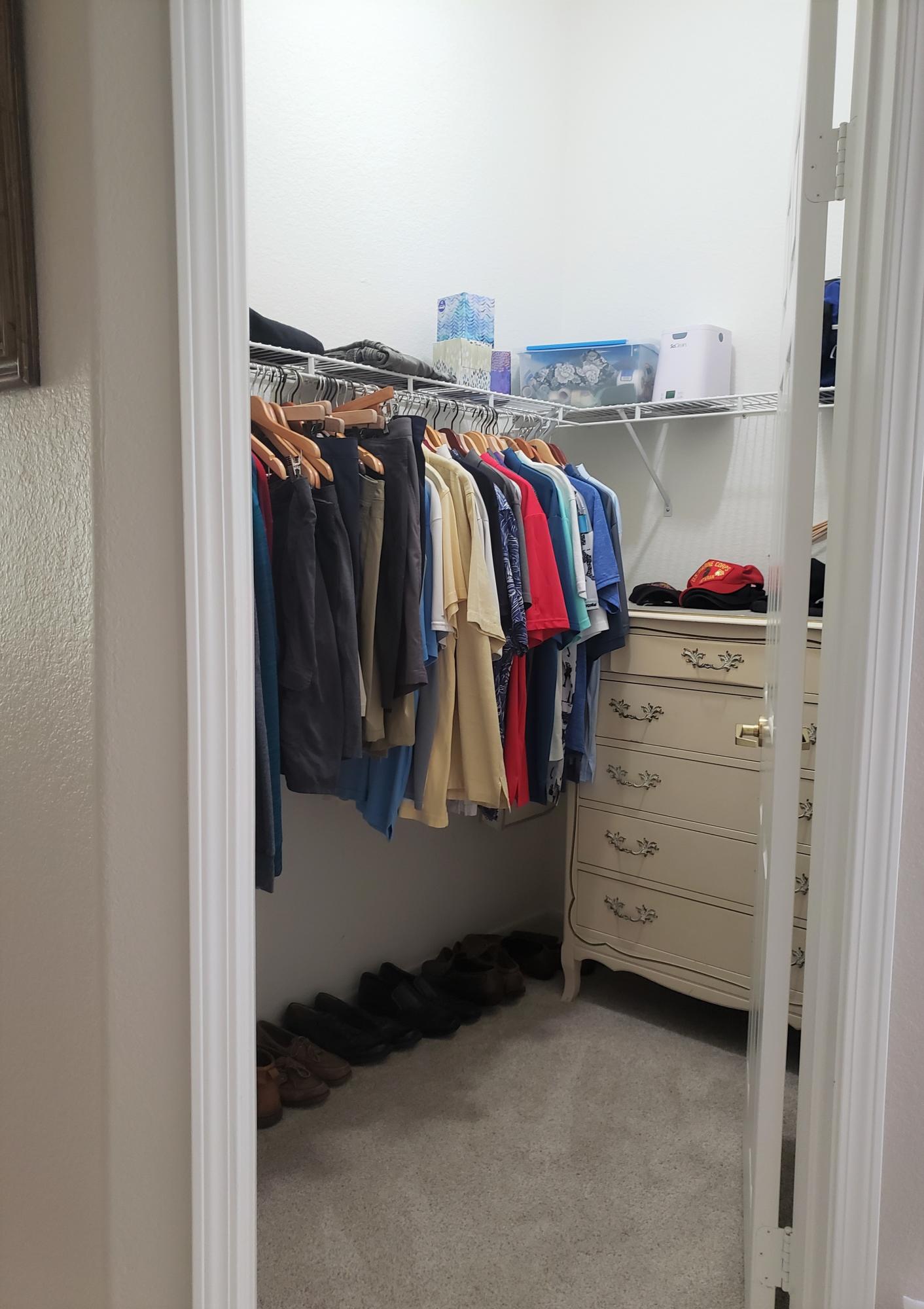44017 Royal Troon Drive Indio, CA 92201 - Photo 20 of 33 a view of walk in closet with clothes