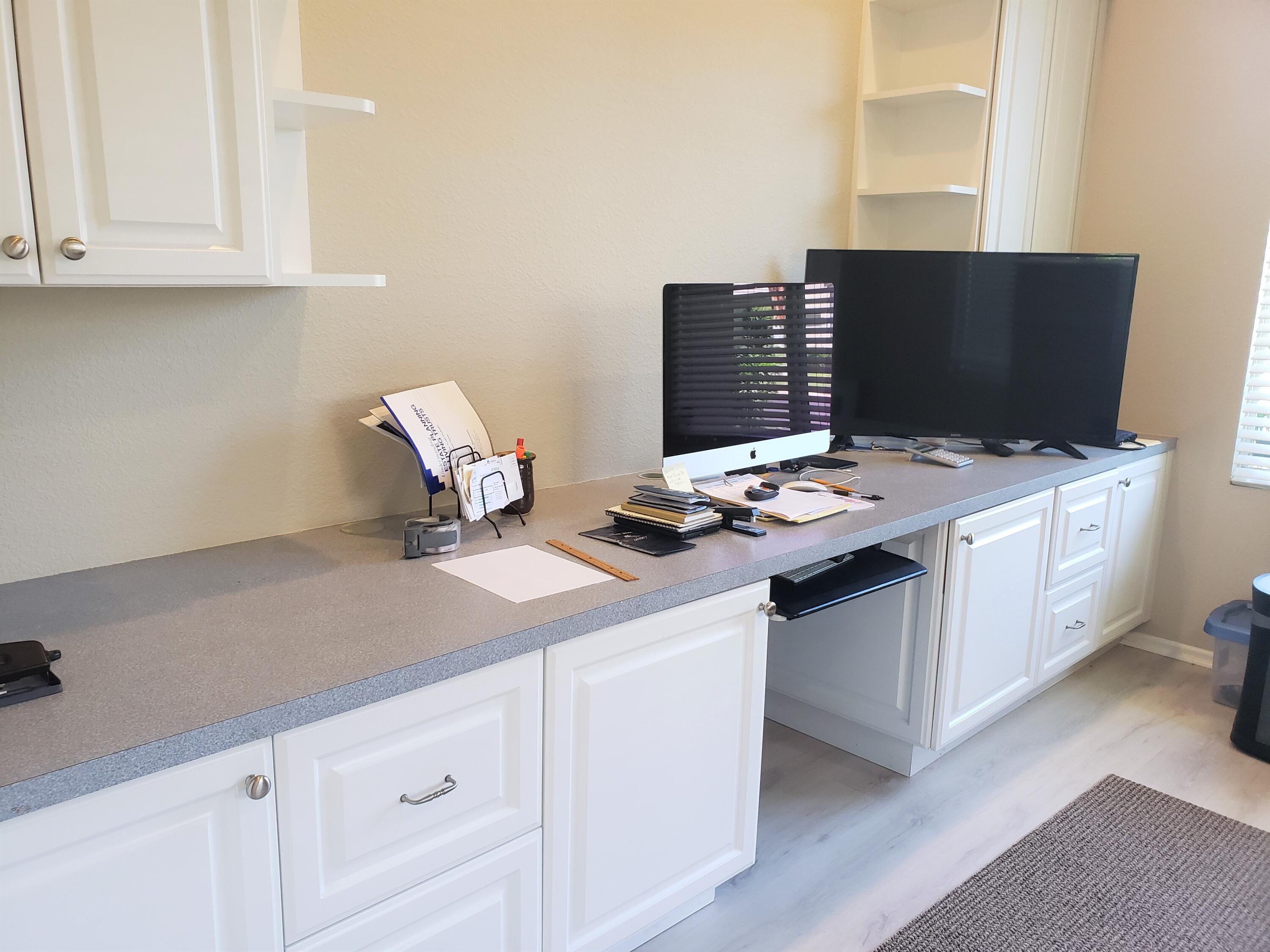 44017 Royal Troon Drive Indio, CA 92201 - Photo 22 of 33 a workspace with furniture and wooden floor
