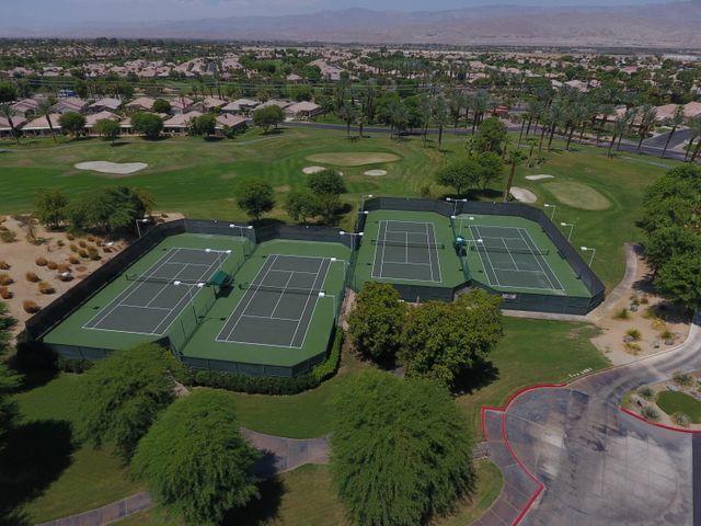 44017 Royal Troon Drive Indio, CA 92201 - Photo 32 of 33 an aerial view of a house with a garden and lake view