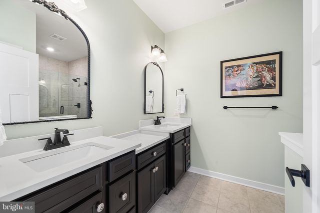 a bathroom with a shower and toilet