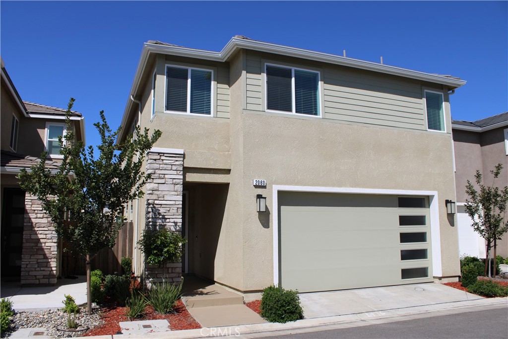 a house that has a window in front of it