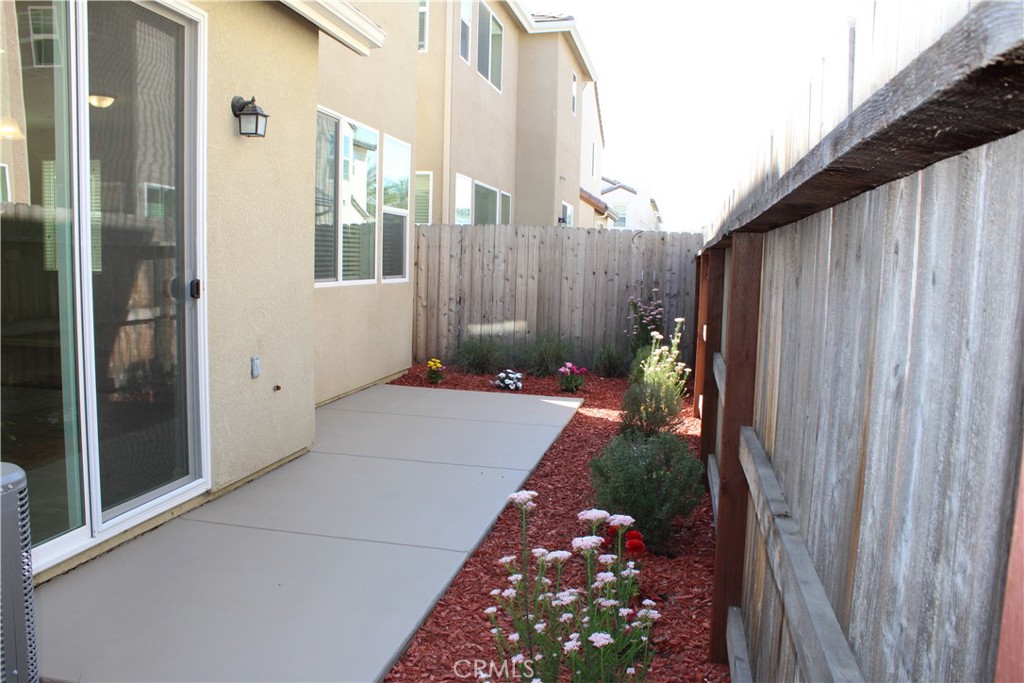 2060 North Walker Lane Clovis, CA 93619 - Photo 16 of 17 a backyard of a house with lots of green space