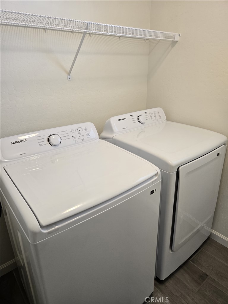 2060 North Walker Lane Clovis, CA 93619 - Photo 9 of 17 a utility room with dryer and washer