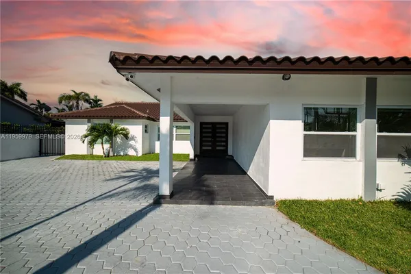 a view of swimming pool with a patio and a yard