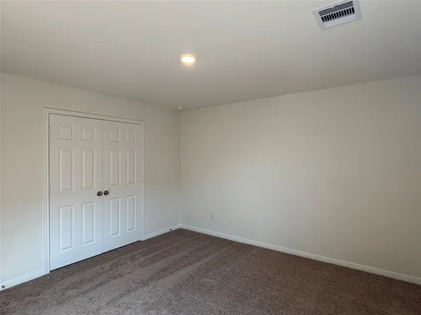a bathroom with a sink mirror toilet and bathtub