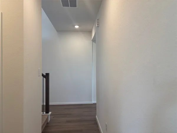 a bathroom with a tub and shower