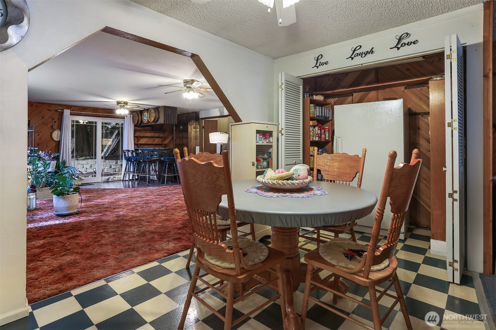 11120 3rd Place Southeast Everett, WA 98208 - Photo 11 of 35 a view of a dining room with furniture and chandelier