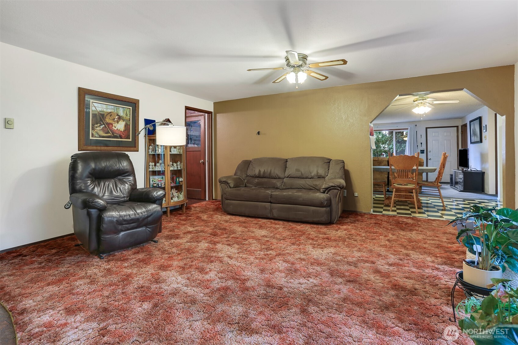 11120 3rd Place Southeast Everett, WA 98208 - Photo 15 of 35 a living room with furniture and a chandelier