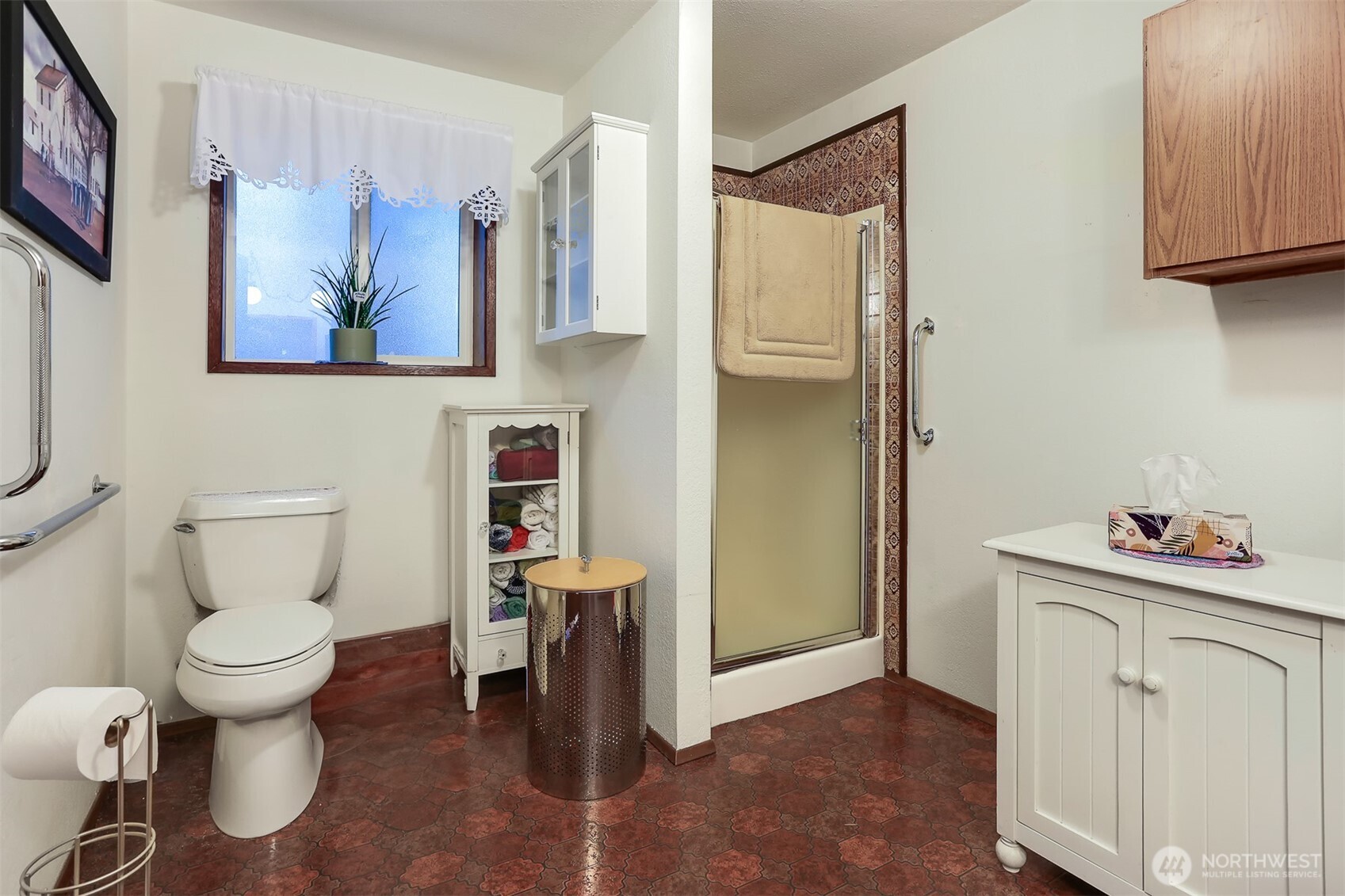11120 3rd Place Southeast Everett, WA 98208 - Photo 19 of 35 a bathroom with a toilet sink and mirror