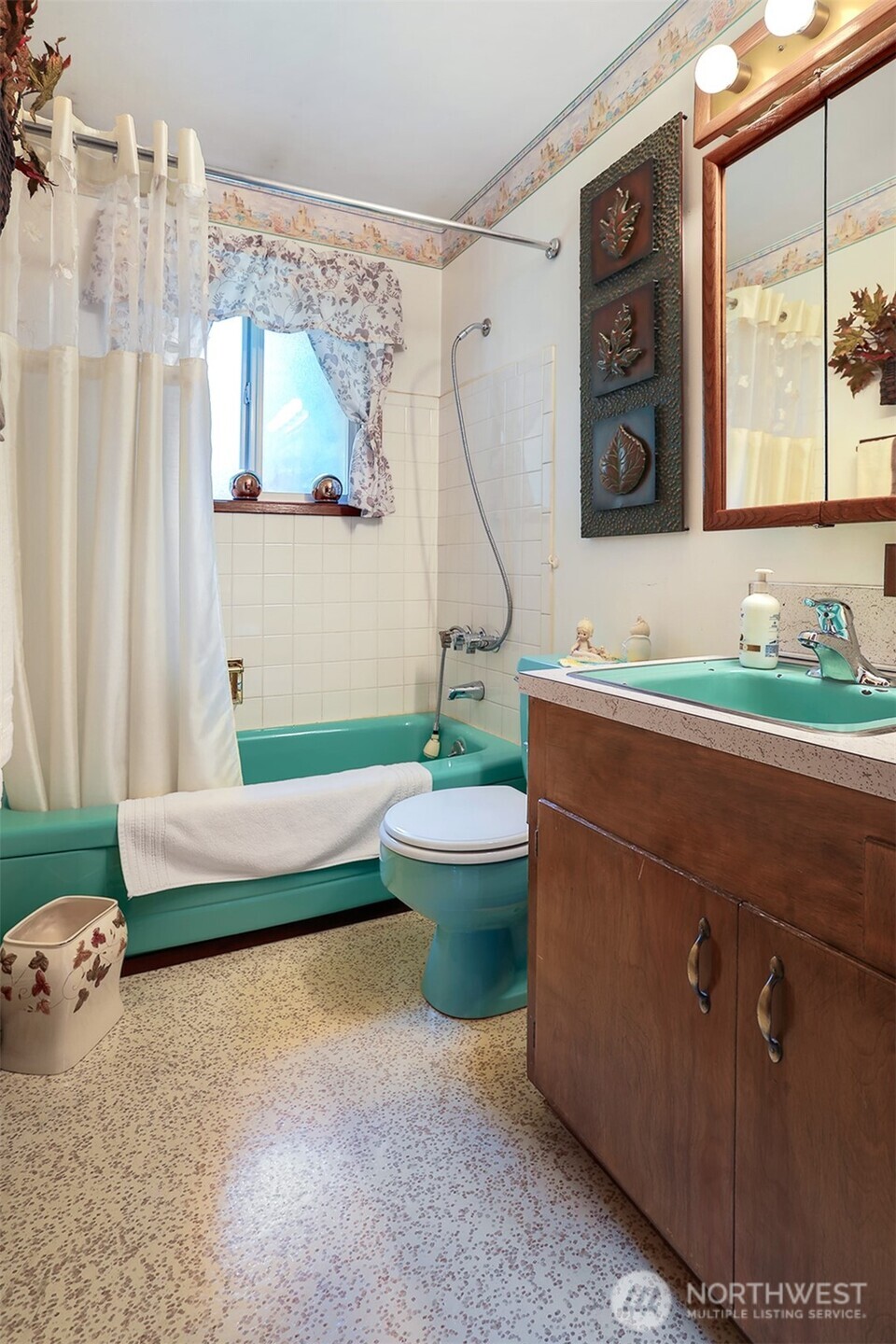 11120 3rd Place Southeast Everett, WA 98208 - Photo 23 of 35 a bathroom with a sink toilet and mirror