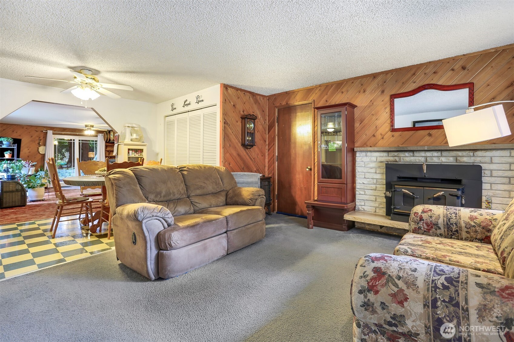 11120 3rd Place Southeast Everett, WA 98208 - Photo 3 of 35 a living room with furniture and a fireplace