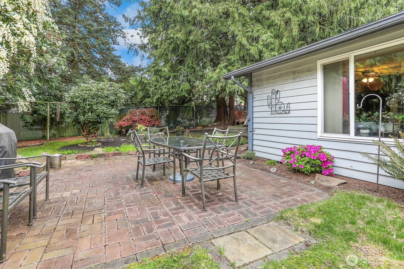 11120 3rd Place Southeast Everett, WA 98208 - Photo 31 of 35 a view of a chairs and table in the backyard