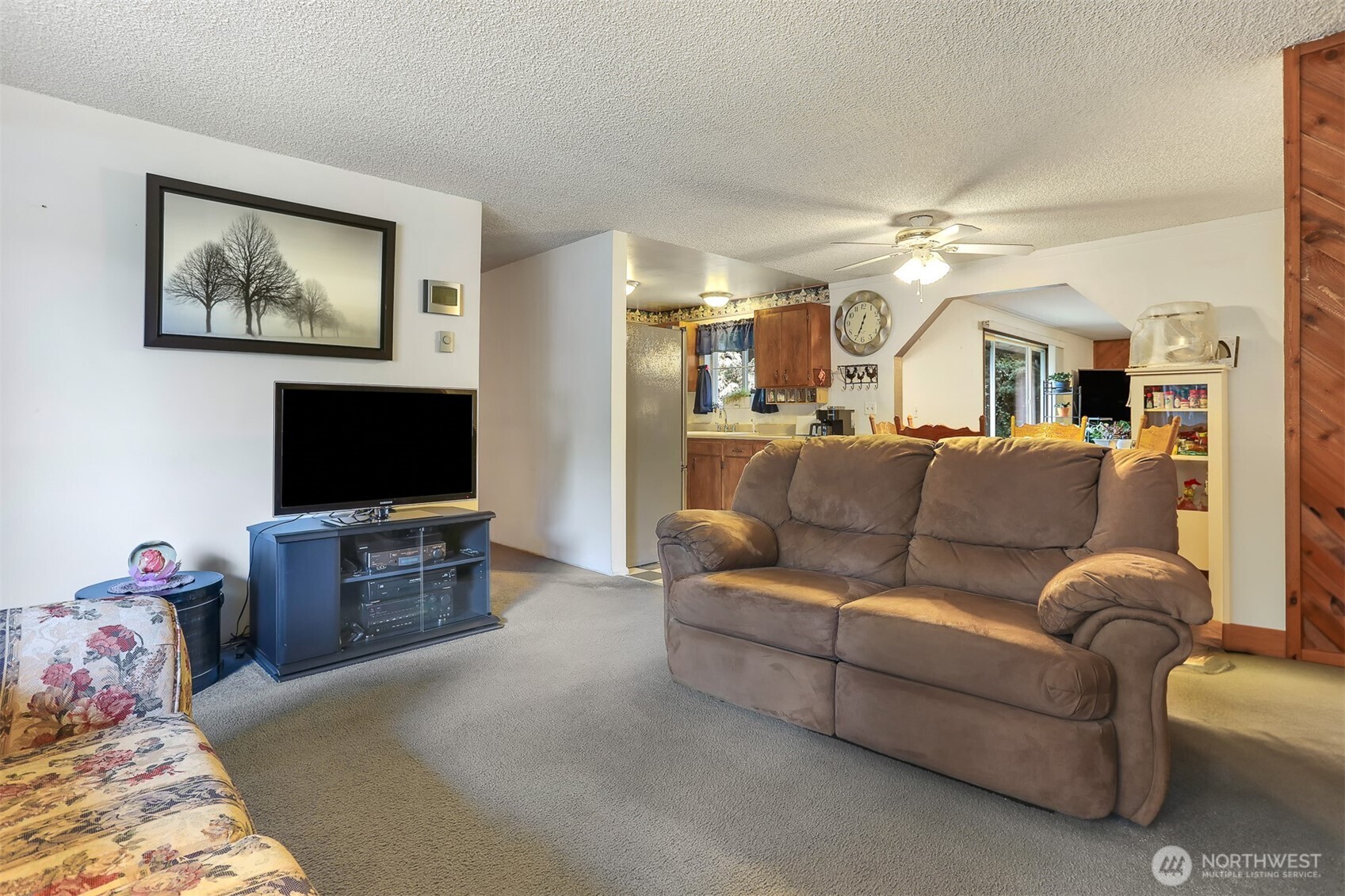 11120 3rd Place Southeast Everett, WA 98208 - Photo 5 of 35 a living room with furniture and a flat screen tv