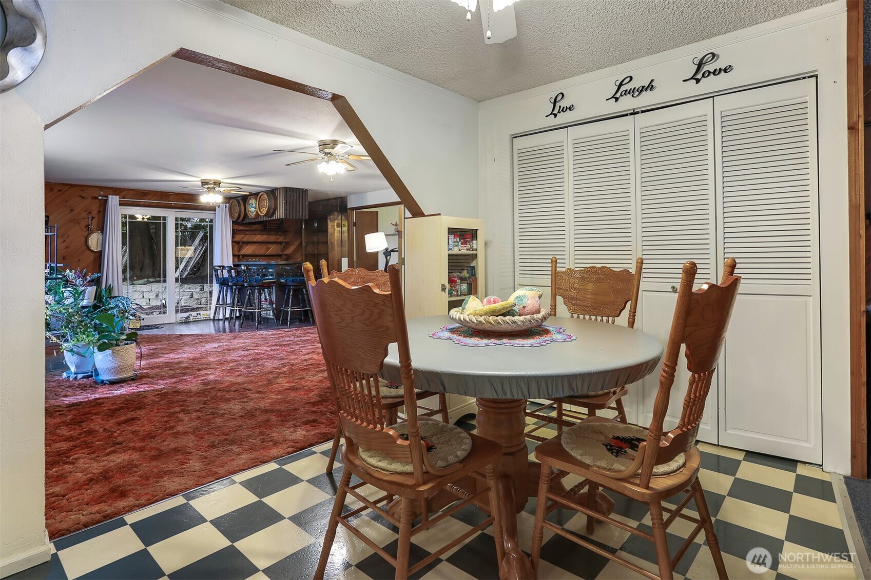 11120 3rd Place Southeast Everett, WA 98208 - Photo 10 of 35 a view of a dining room with furniture and chandelier