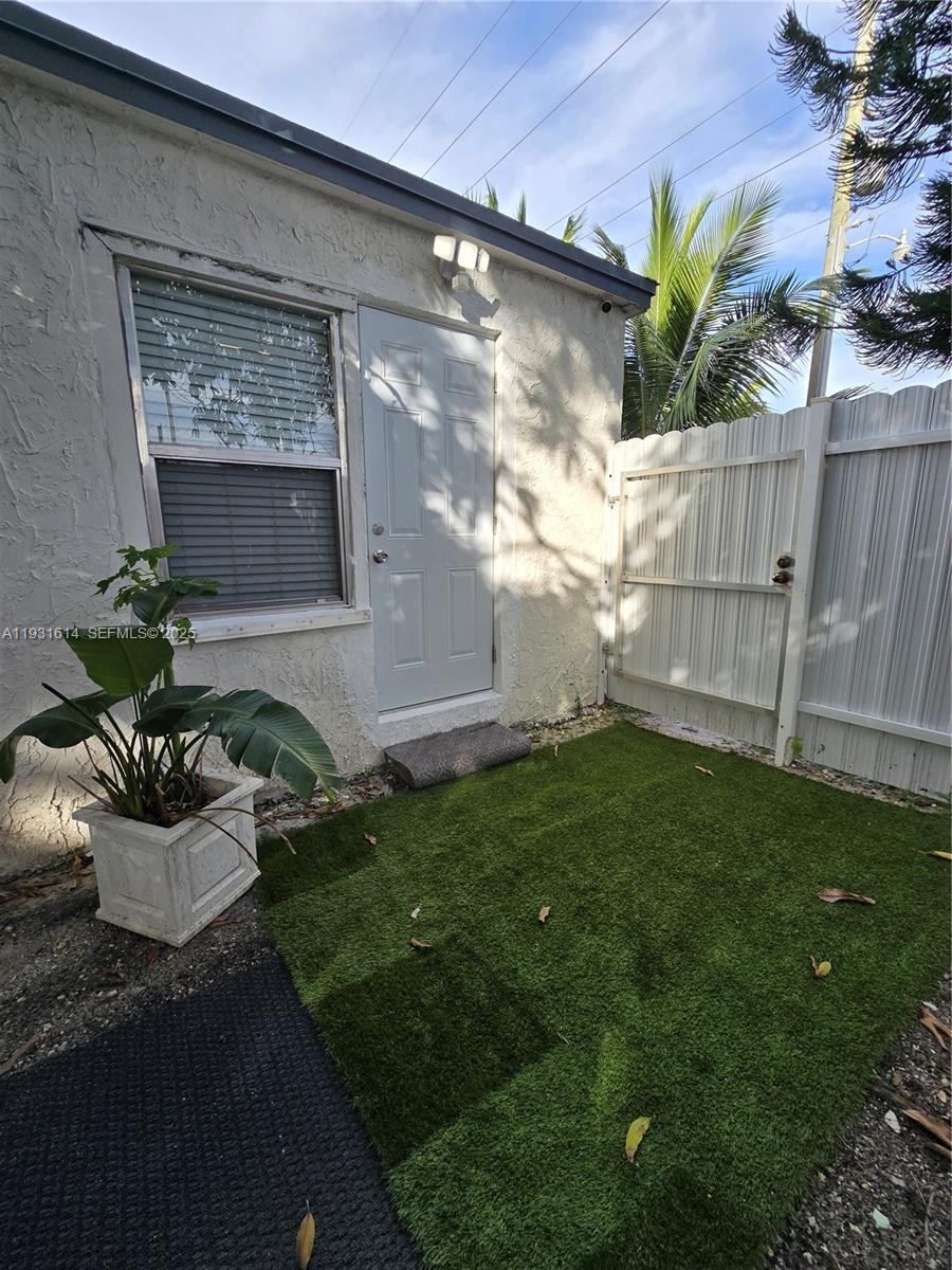 13340 Northeast 16th Avenue North Miami, FL 33161 - Photo 13 of 18 a view of house with backyard and garden